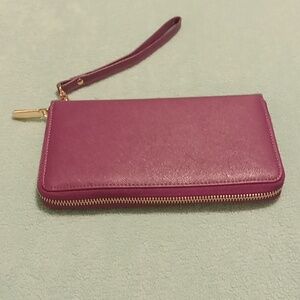 Purple wallet very spacious, holds alot!